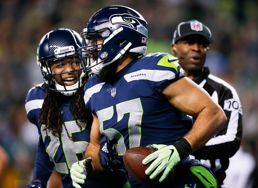 SEATTLE, WA - DECEMBER 03: Linebacker Michael Wilhoite #57 of the Seattle Seahawks...