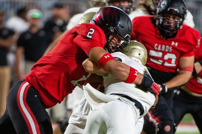 Melissa defensive end Nigel Smith (2) sacks Royse City quarterback Jace Oliver (5) in the...