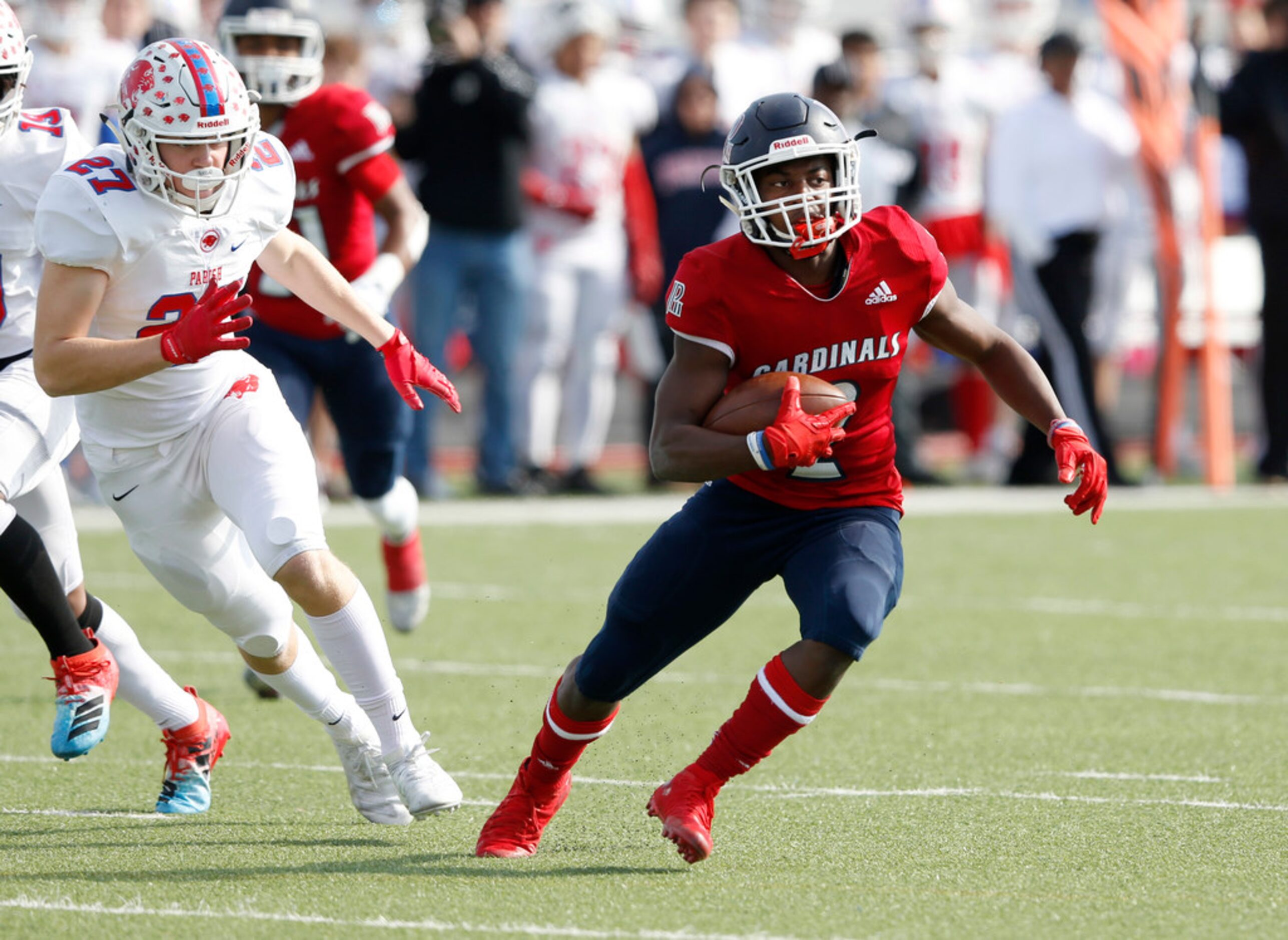 Plano John Paul II's Myles Parker (2) breaks away from Parish Episcopal's Henry Partridge...