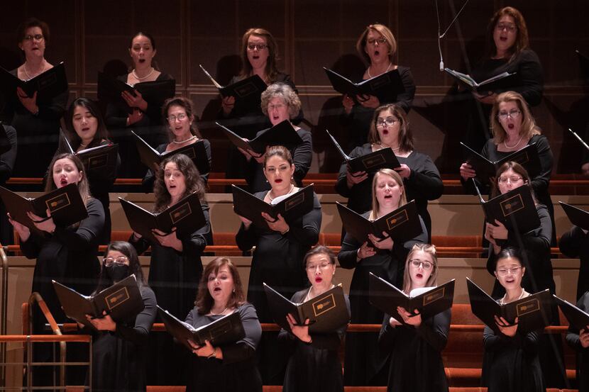 Members of the Dallas Symphony Chorus performs Lobgesang (A Symphony Cantata) by...