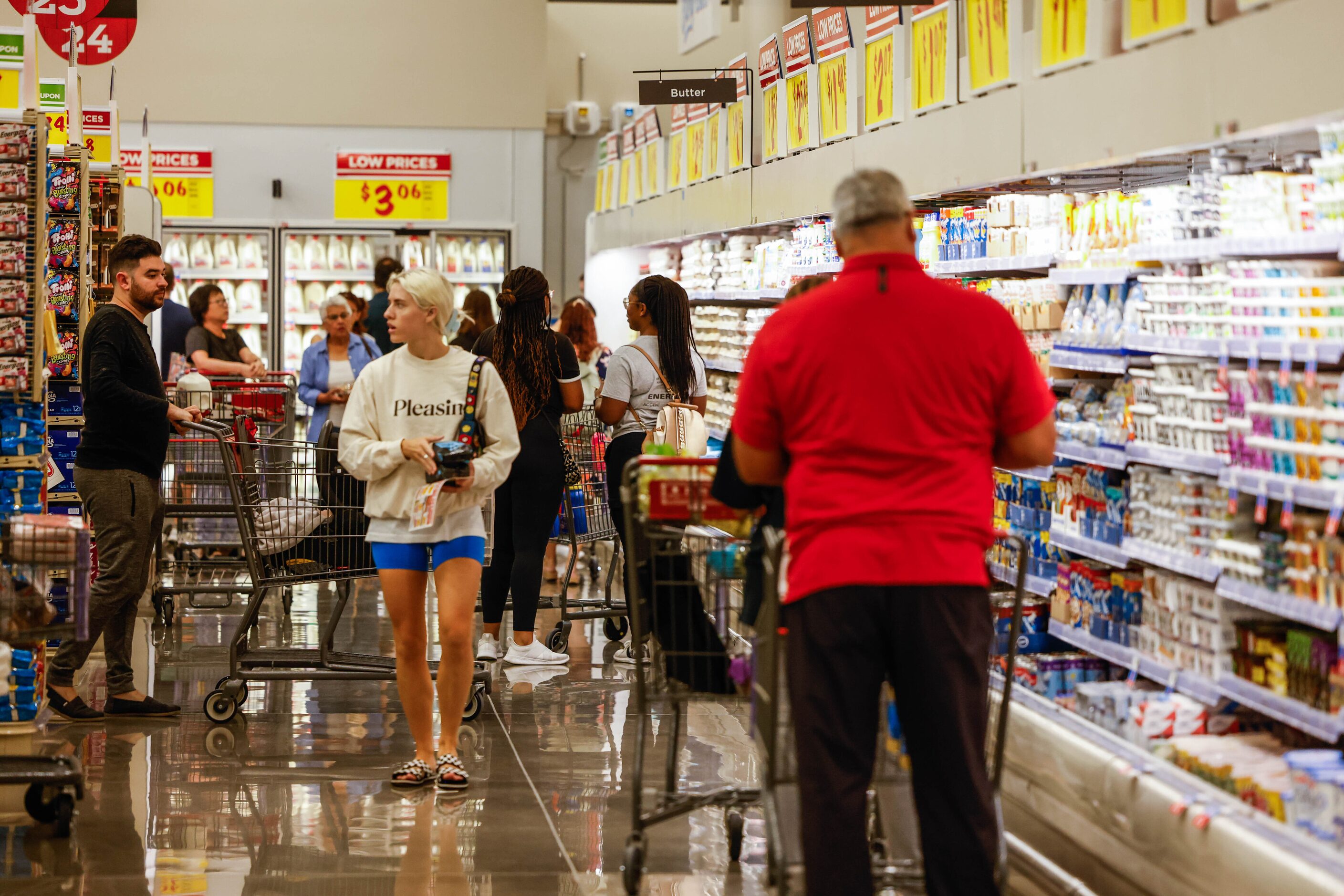 Customers do their regular grocery shopping at the new H-E-B store that opened its doors at...