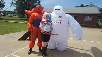 Melissa McGinnis as Baymax, husband Erin as armored Baymax and  daughter Rosaleen as Harley...