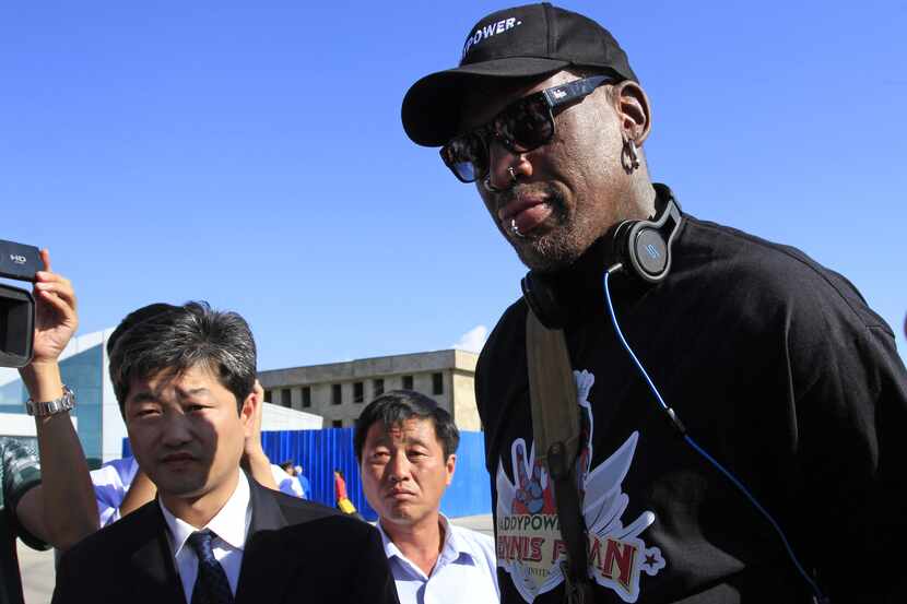 Former NBA star Dennis Rodman arrives at Pyongyang airport, North Korea,  Tuesday, Sept. 3,...