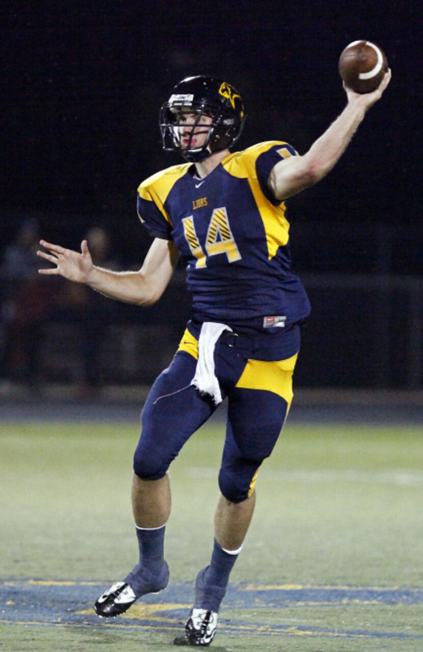 Prestonwood Christian Academy quarterback Mickey Mithcell (14) throws a pass against Liberty...