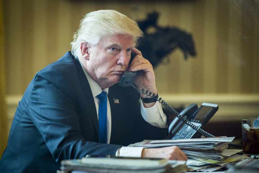 President Donald Trump speaks on the phone with Russian President Vladimir Putin from the...