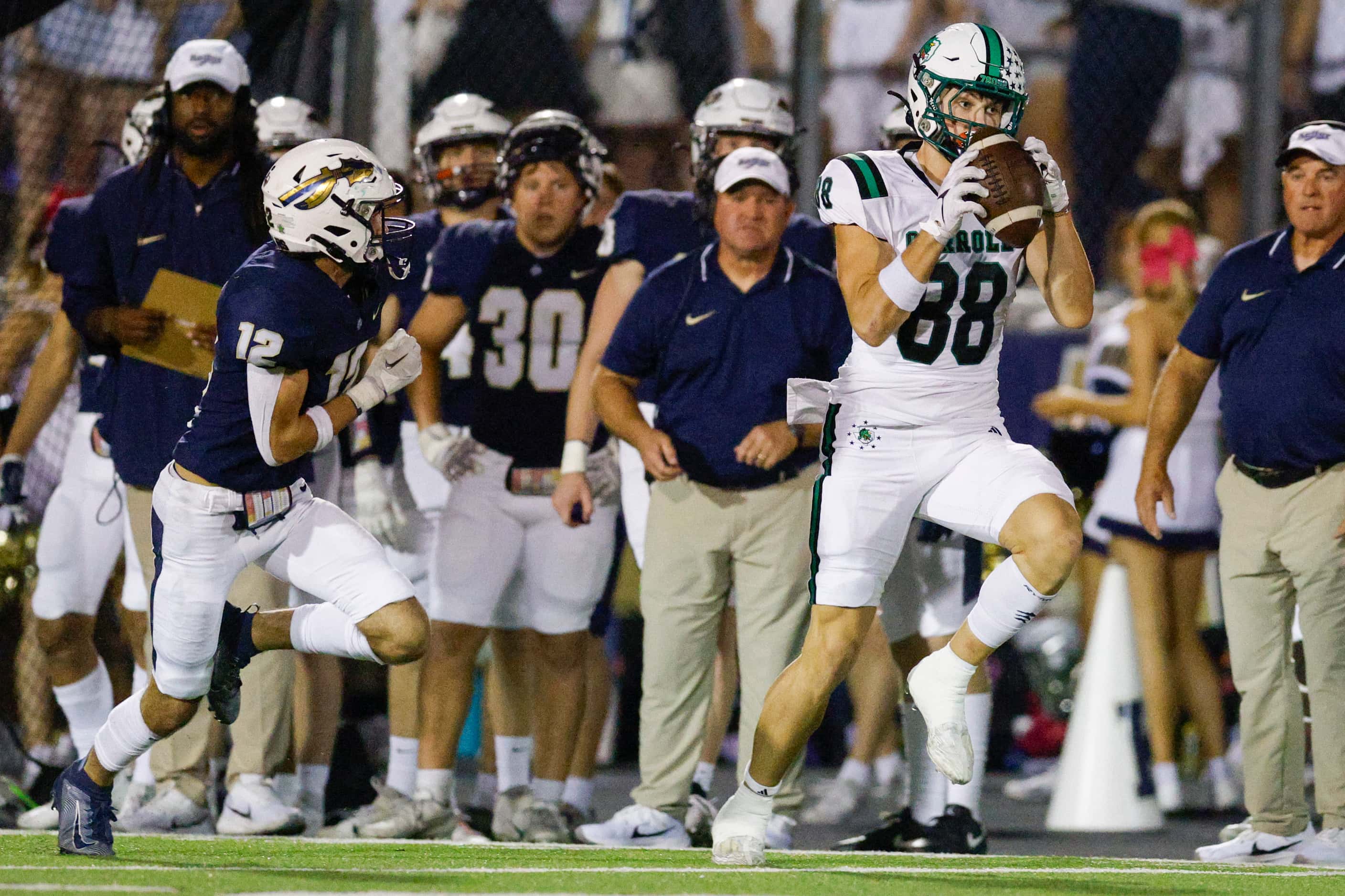 Southlake Carroll tight end Jack Van Dorselaer (88) makes a catch for a 91-yard touchdown...