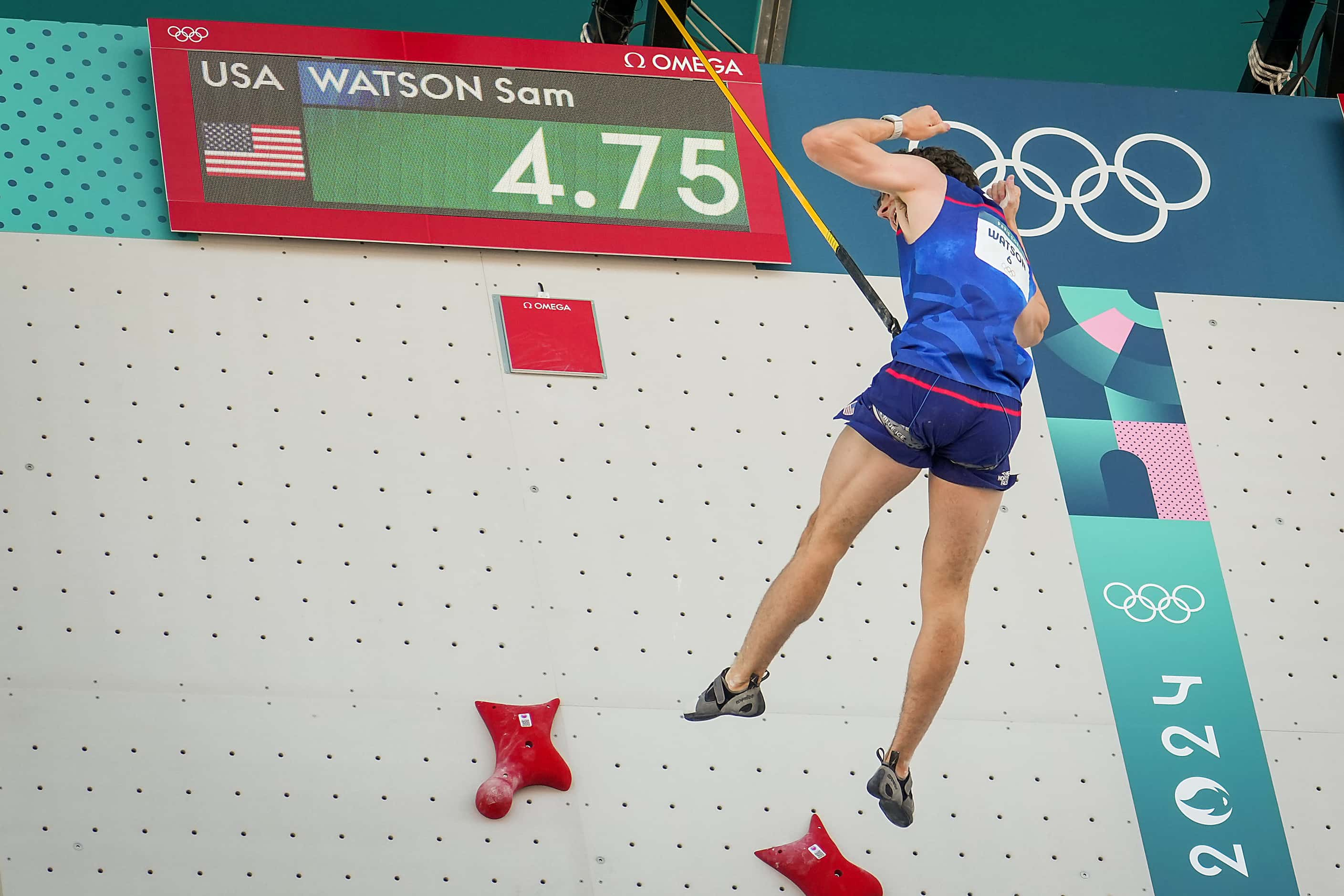 Sam Watson of the United States celebrates after breaking his own world record with a time...