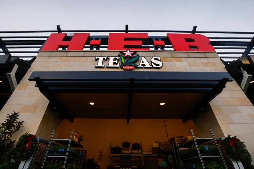 Wreaths hang on either side of an entrance to the H-E-B in Plano, one of two namesake stores...