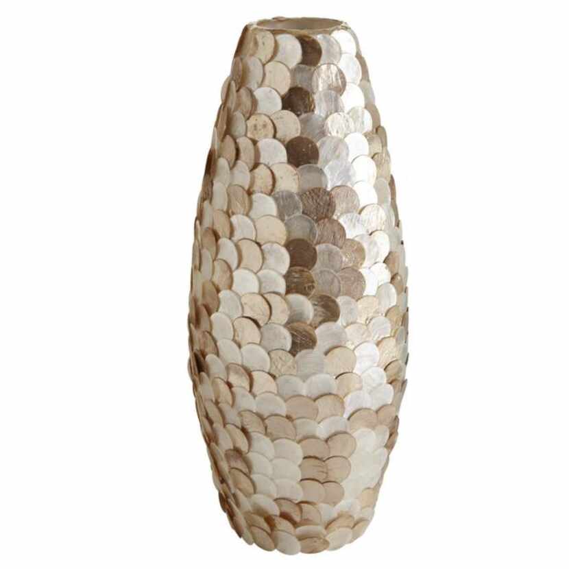 
Pier 1’s handcrafted capiz disco vase ($34.95, pier1.com) is not watertight. Fill it with...