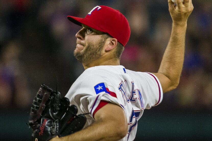 Texas Rangers relief pitcher Shawn Tolleson (37) pitches during the eighth inning of their...