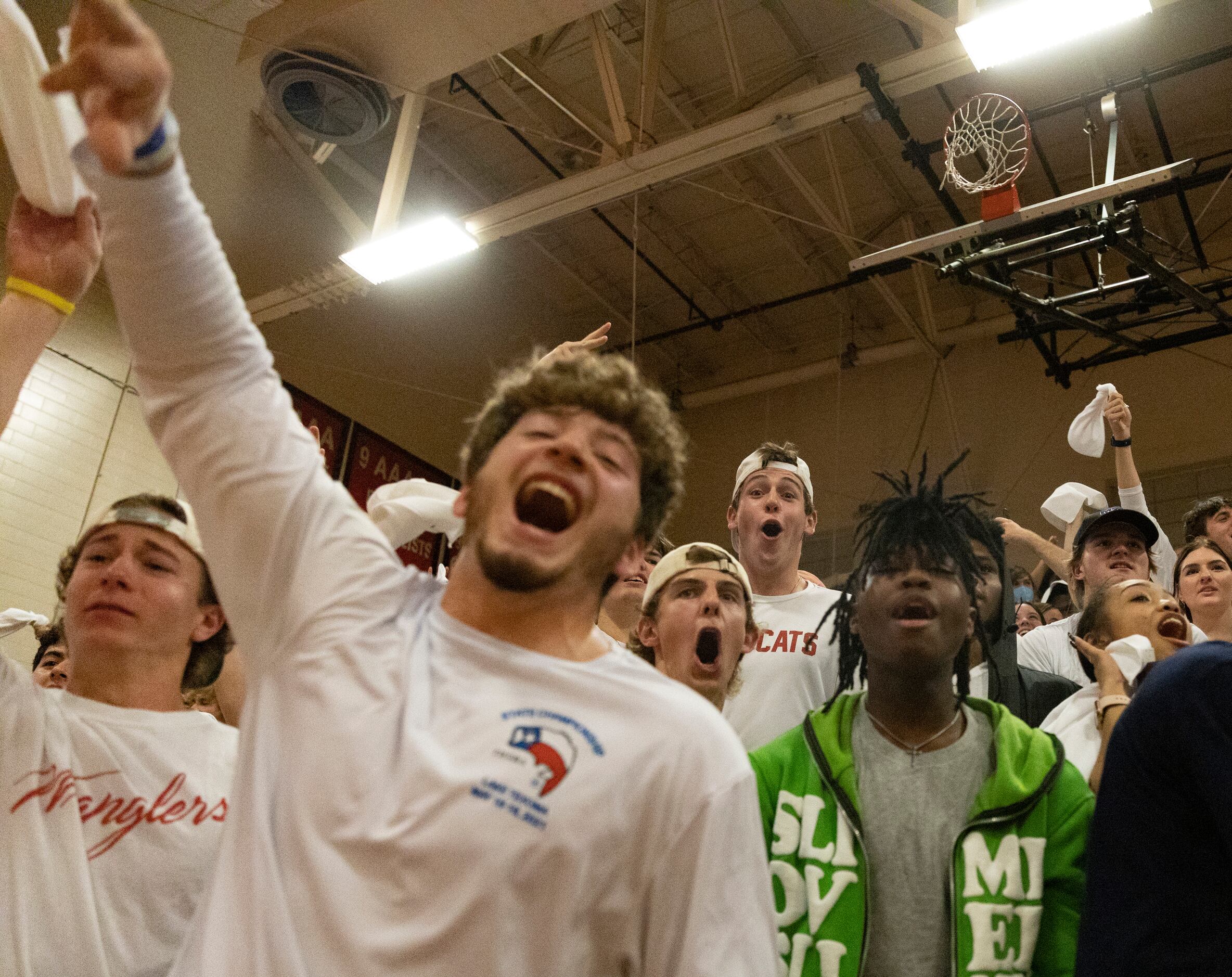 Lake Highlands High School fans cheer from the stands during the game in Dallas, Tuesday,...