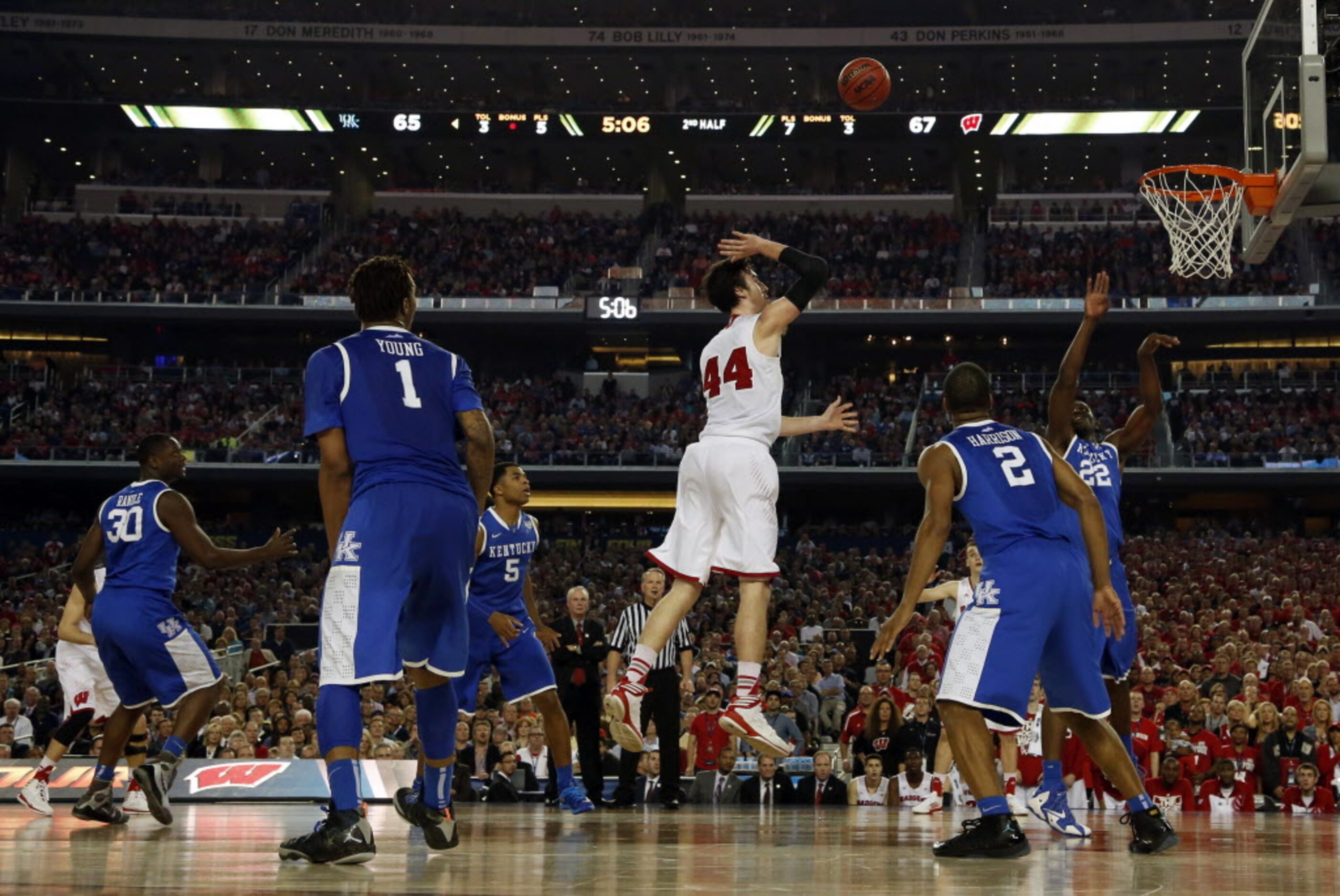 Wisconsin Badgers forward Frank Kaminsky (44) takes a shot during the second half of a...