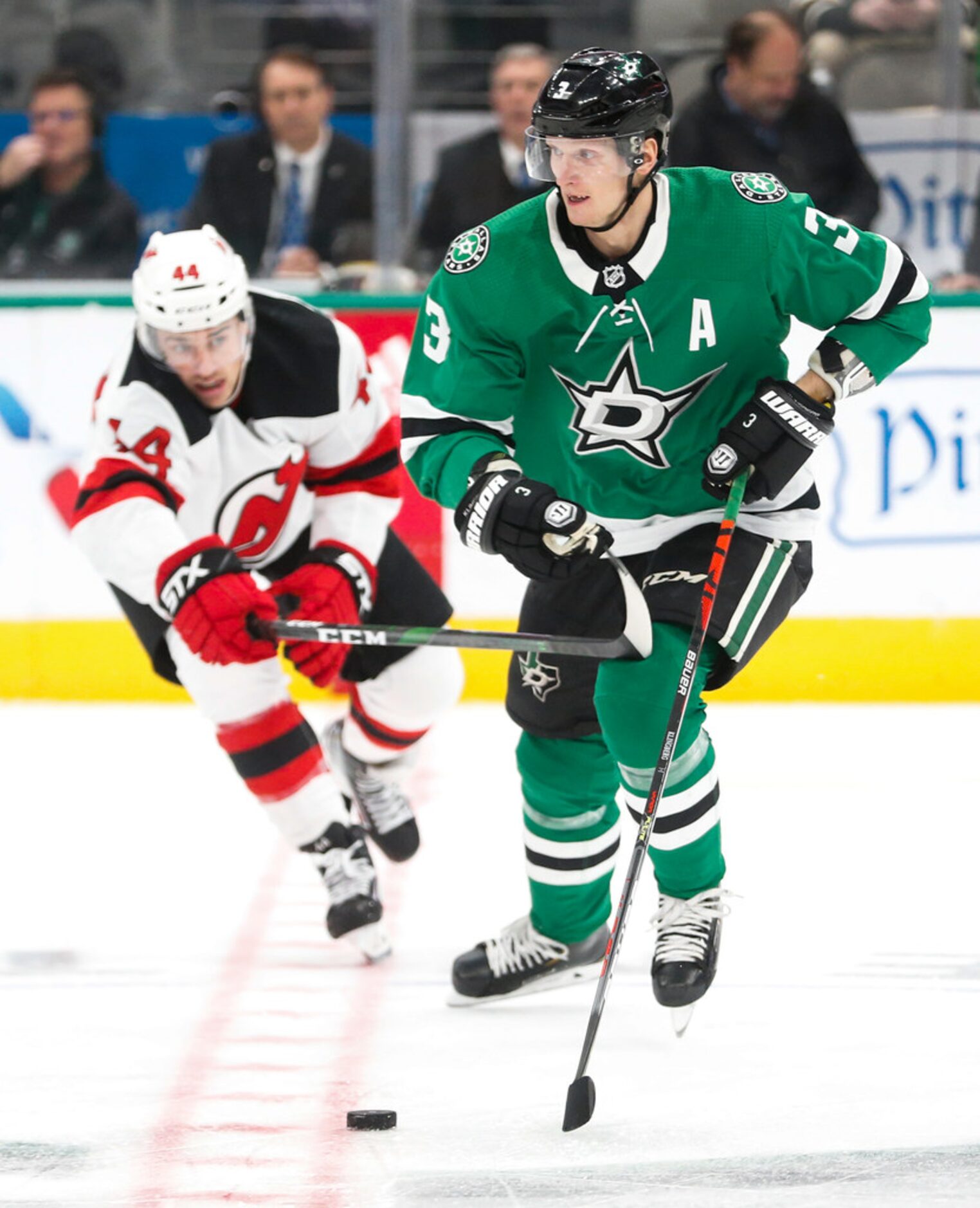 Dallas Stars defenseman John Klingberg (3) breaks away from New Jersey Devils left wing...