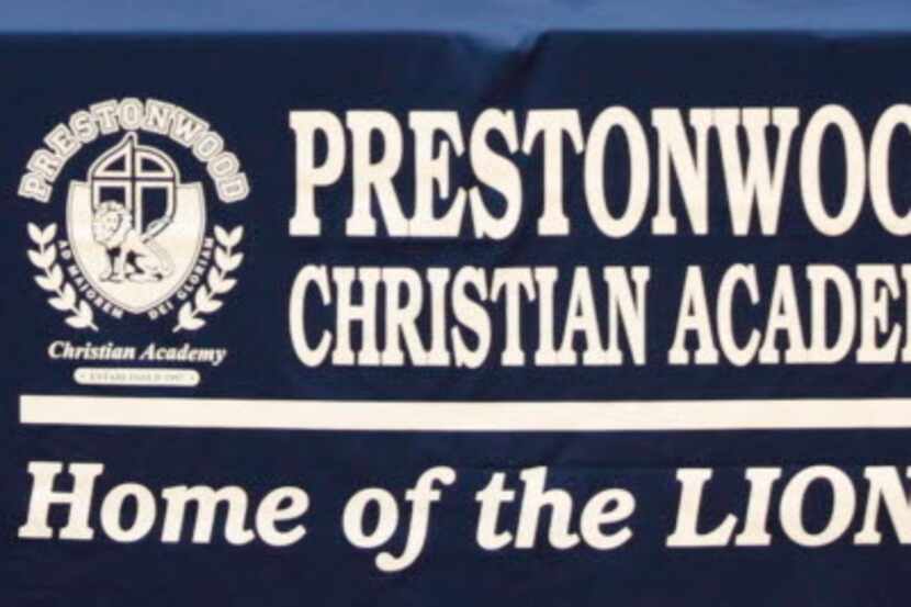 Parent Christi and Tim Peters, left, and Prestonwood Christian Academy baskeball coach Brad...