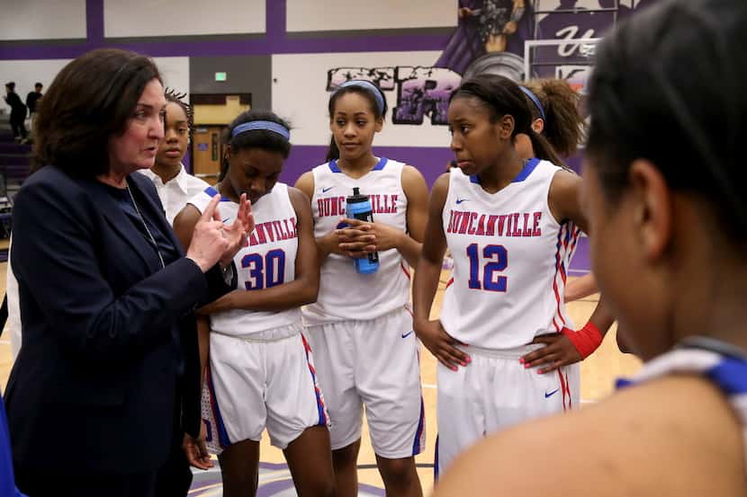Duncanville Pantherettes head coach Cathy Self-Morgan talks to her team following an 83-31...