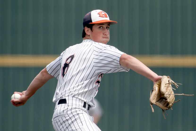 Rockwall pitcher Cade Crossland (8) delivers a pitch during the bottom of the first inning...