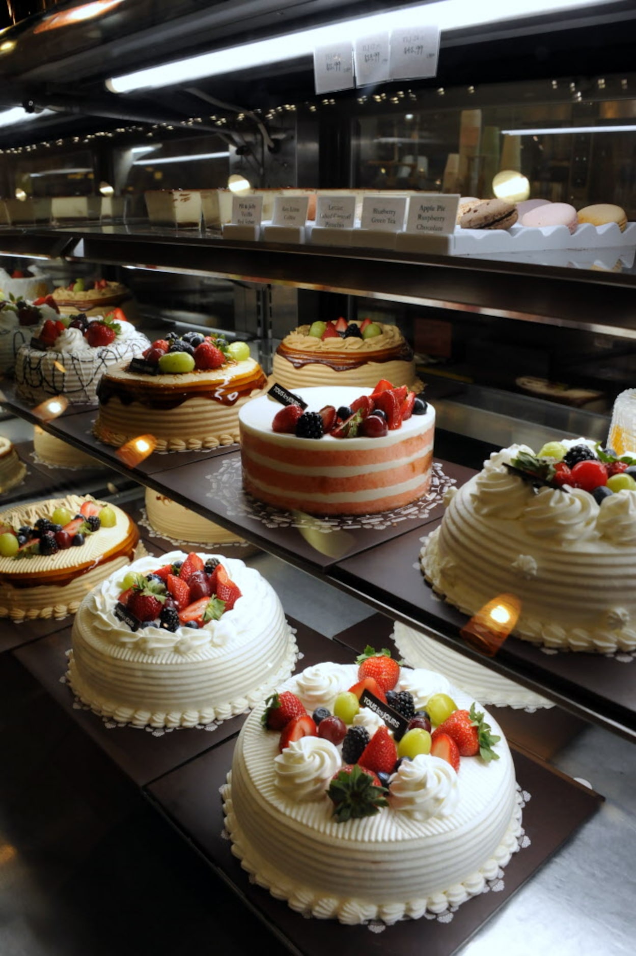 Bakery shop Tous Les Jours features cakes, macaroons, and pastries at H Mart in Carrollton,...