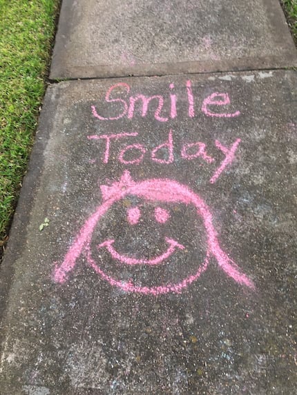 Sidewalk chalk drawings in Richardson offered encouragement in the early weeks of the...