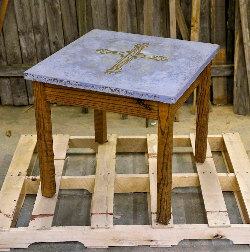 
The Hands’ Cross series of tables features bonded aggregate tops and wood bases and legs.



