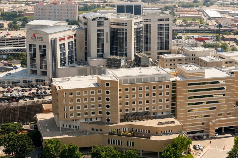  Children's Medical Center of Dallas (white buildings) is seen behind the Zale Lipshy...