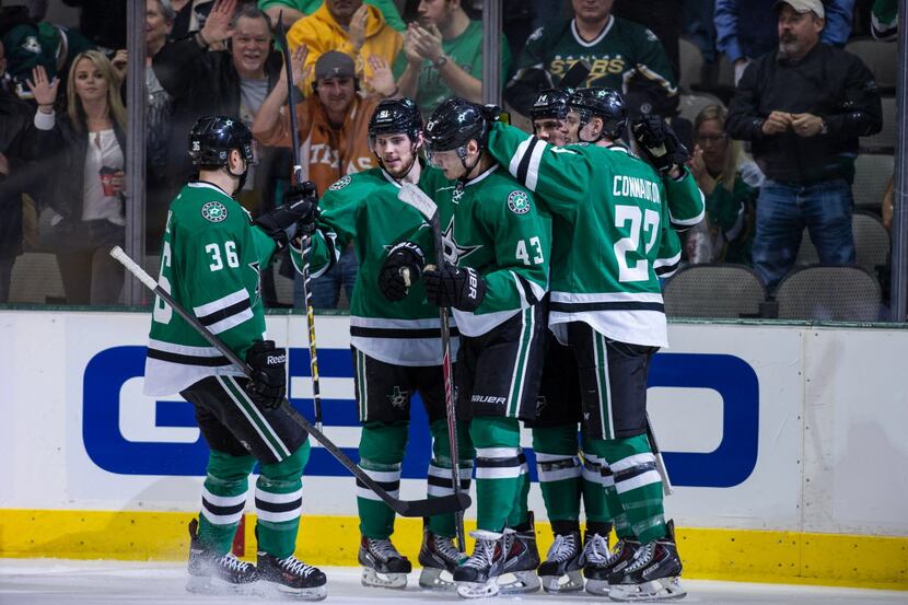 Dec 19, 2013; Dallas, TX, USA; Dallas Stars defenseman Cameron Gaunce (36) and center Tyler...