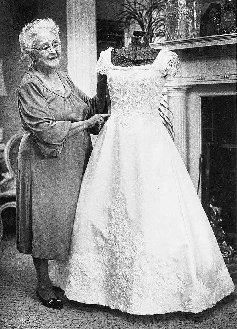 Kay, shown  in a 1981 photo, used a dress form in crafting specialty dresses at her home in...