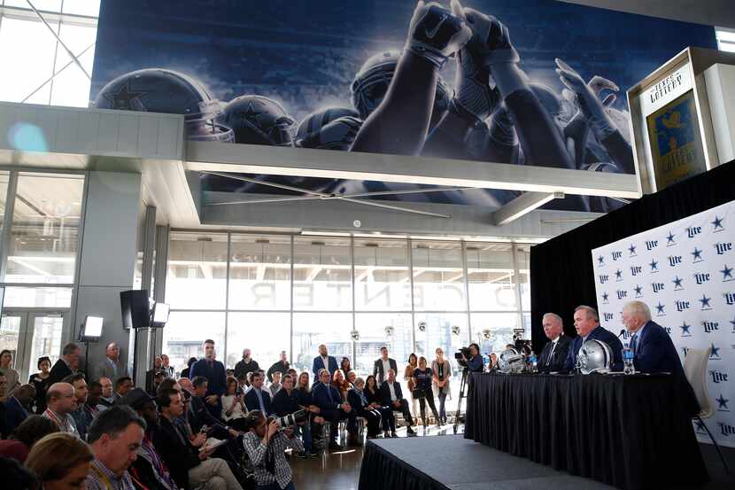 FILE - New Cowboys head coach Mike McCarthy speaks as Cowboys VP Stephen Jones (left) and...