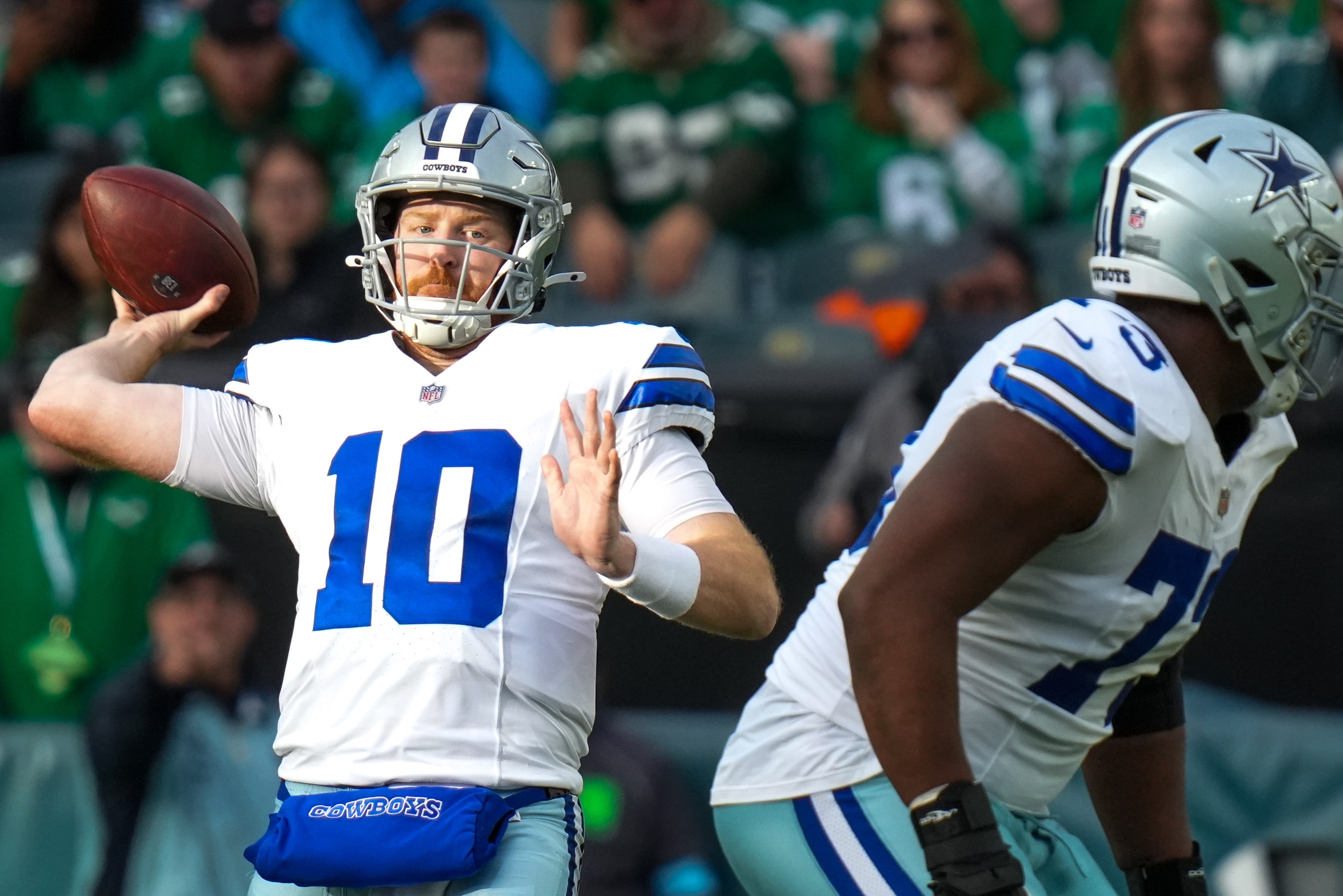 Dallas Cowboys quarterback Cooper Rush (10) throws a pass that was intercepted by...