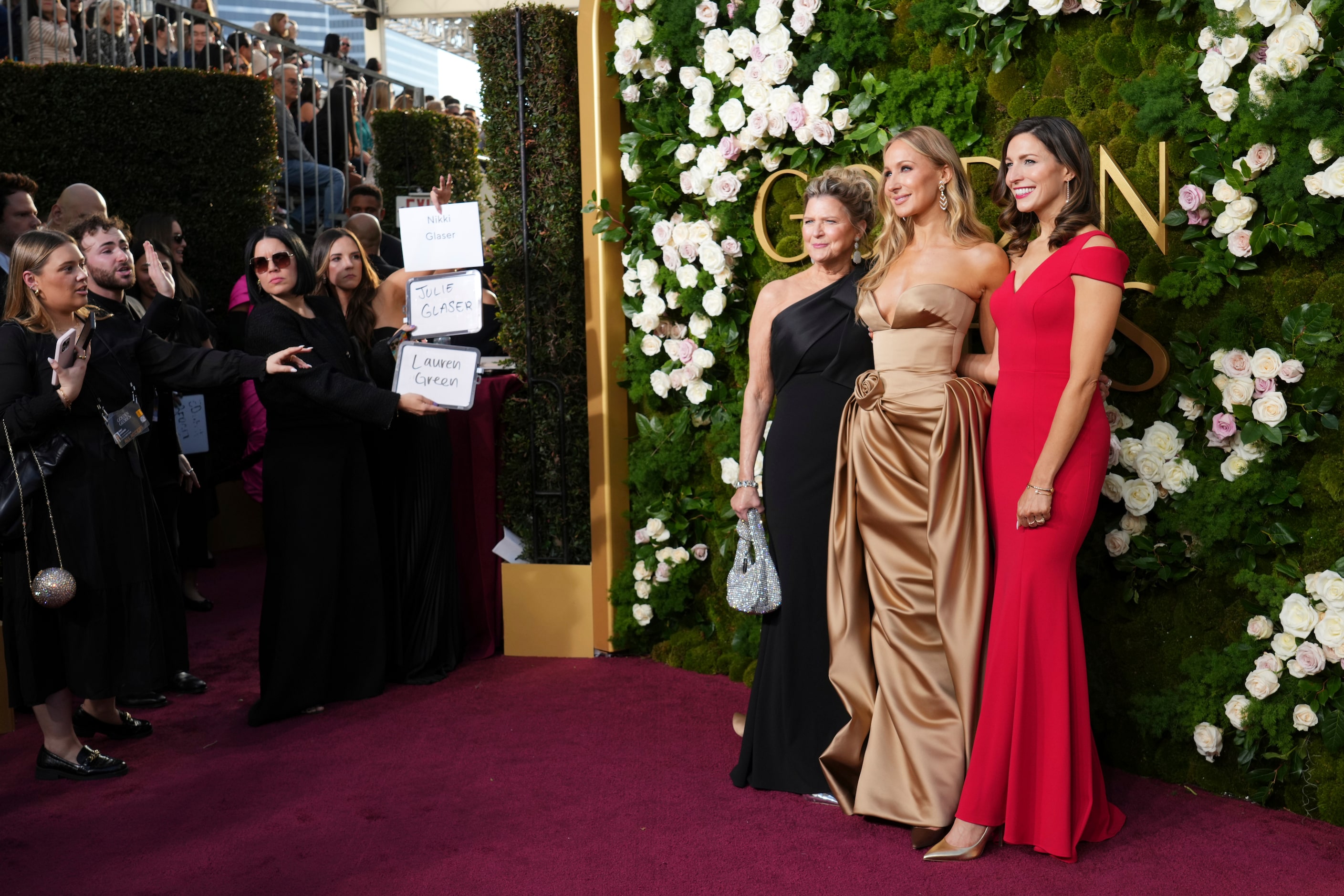 Julie Glaser, from left, Nikki Glaser, and Lauren Green arrive at the 82nd Golden Globes on...