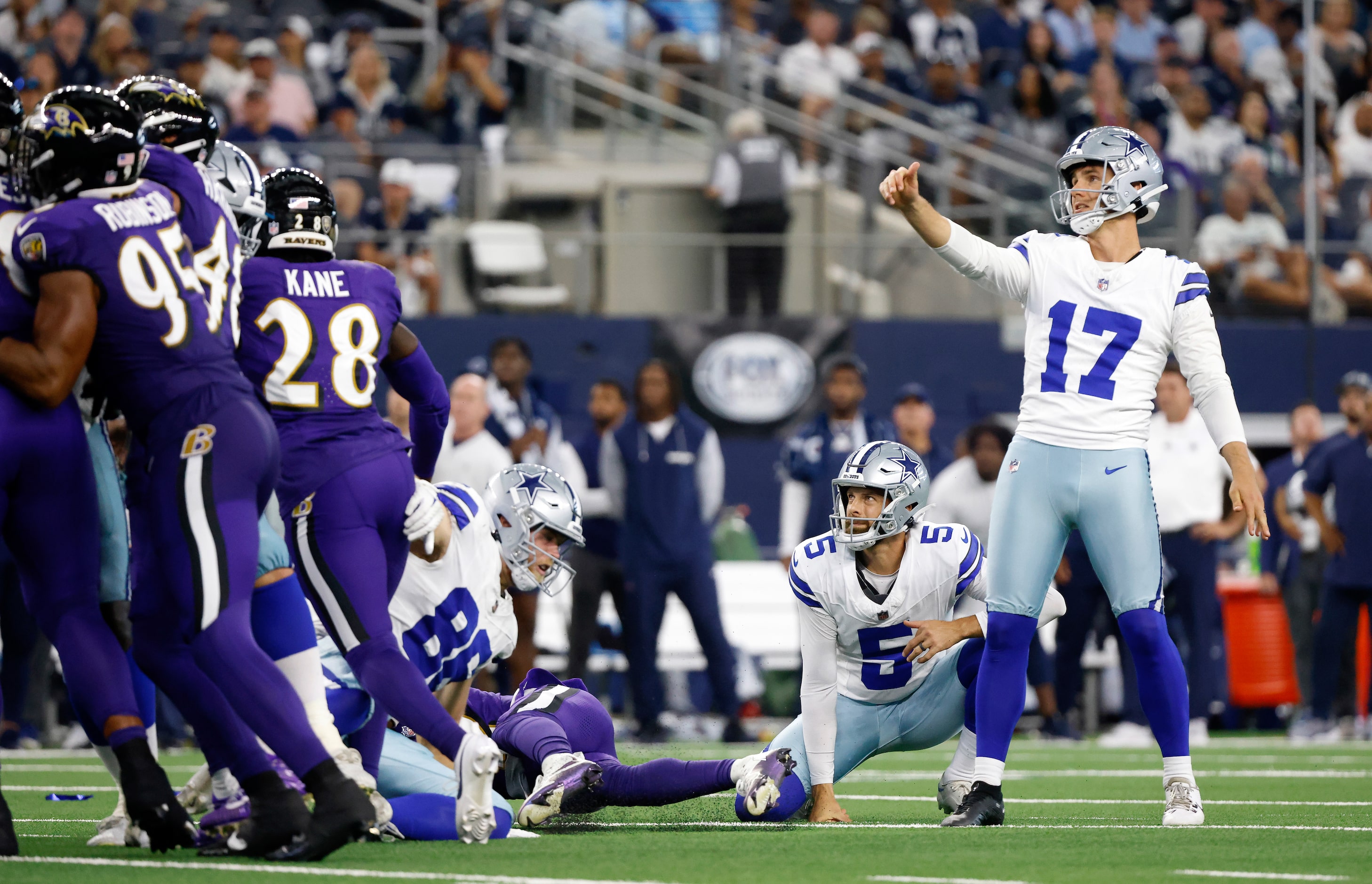 Dallas Cowboys place kicker Brandon Aubrey (17) kicks and makes a field goal just short of...