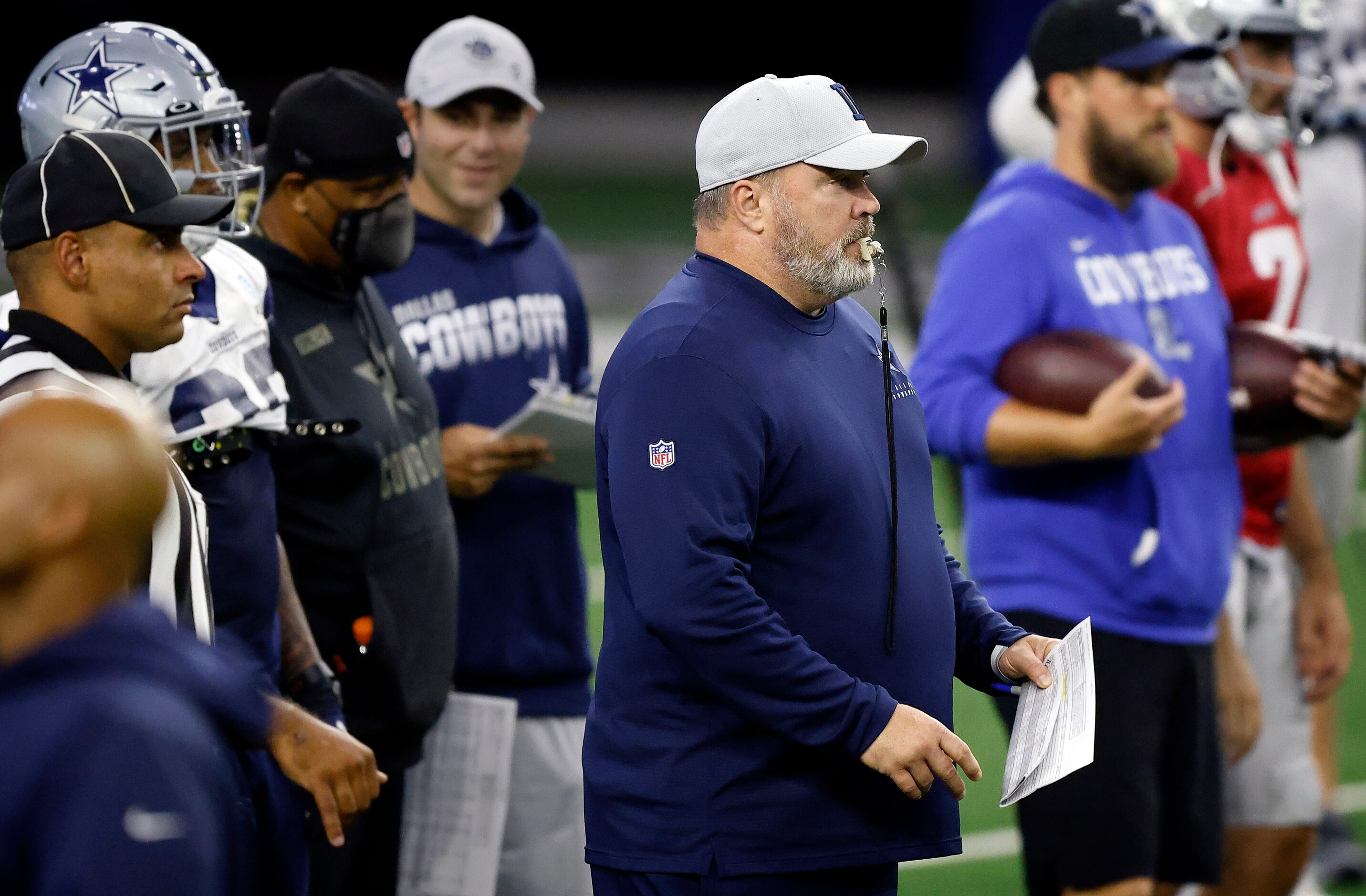 Dallas Cowboys head coach Mike McCarthy watches his offense compete against the defense...