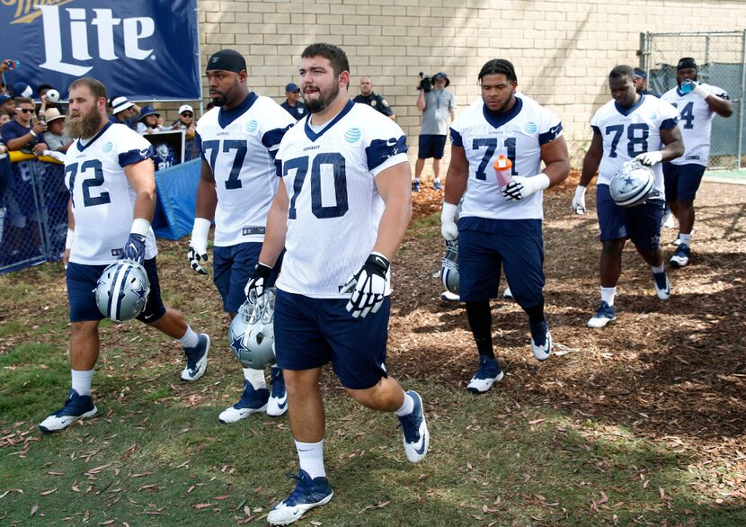 Dallas Cowboys center Travis Frederick (72), Dallas Cowboys tackle Tyron Smith (77), Dallas...