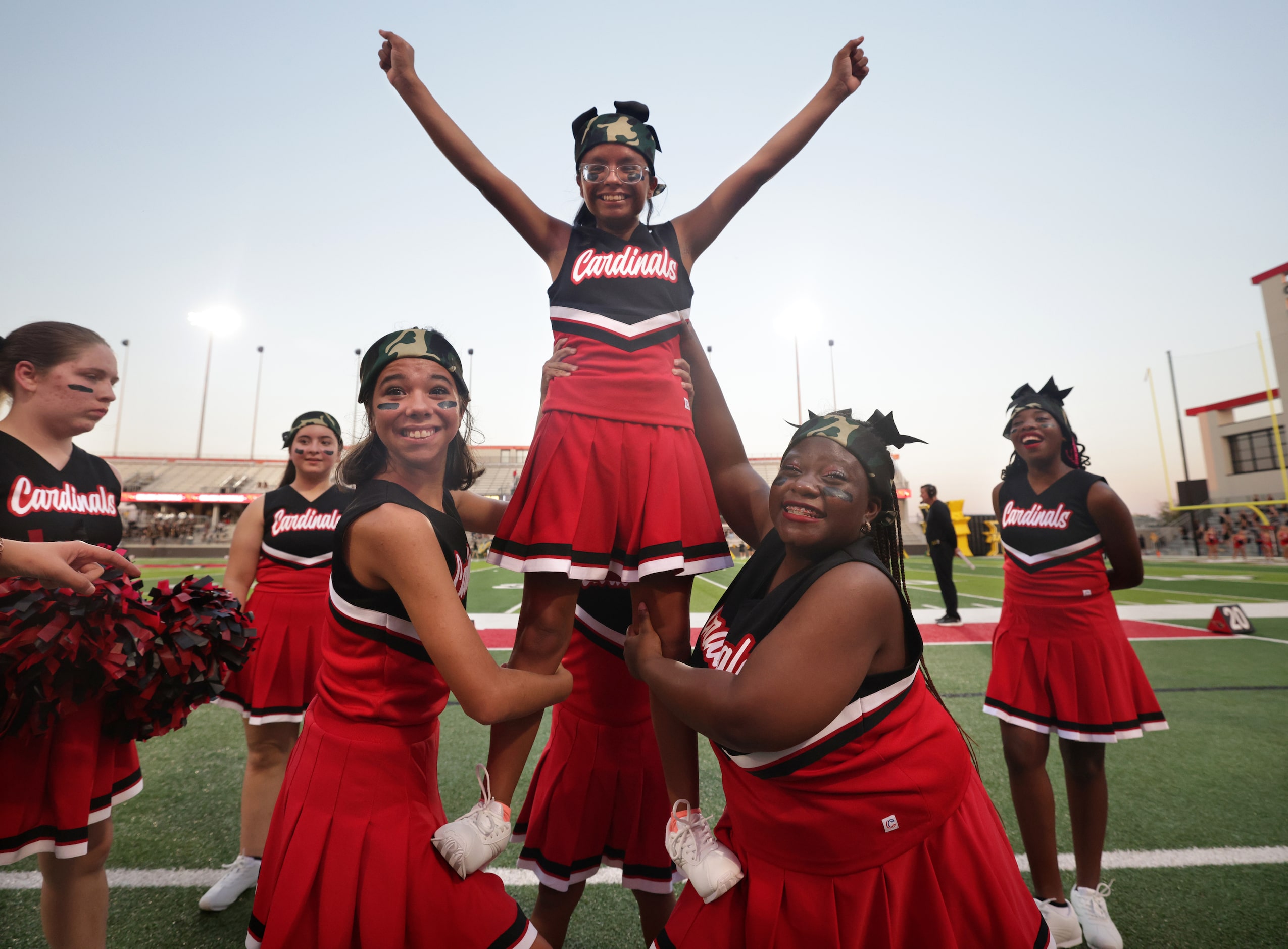 17-year-old Nevaeh Moothart is lifted up for a thigh stand by the Cheer Abilities team...