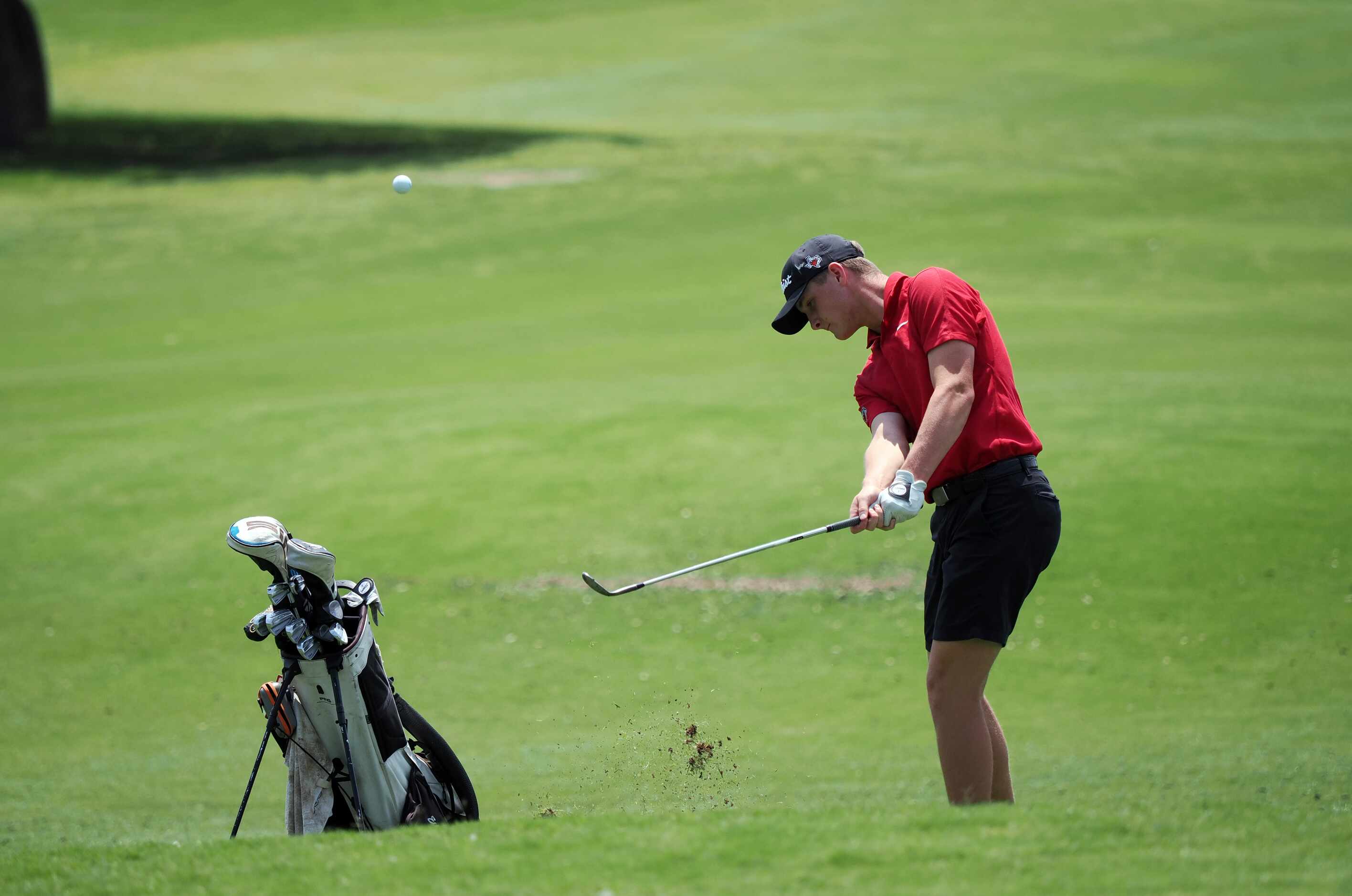 Argyle's Ethan Payne chips onto the green on #7 during round 2 of the UIL Boy’s High School...