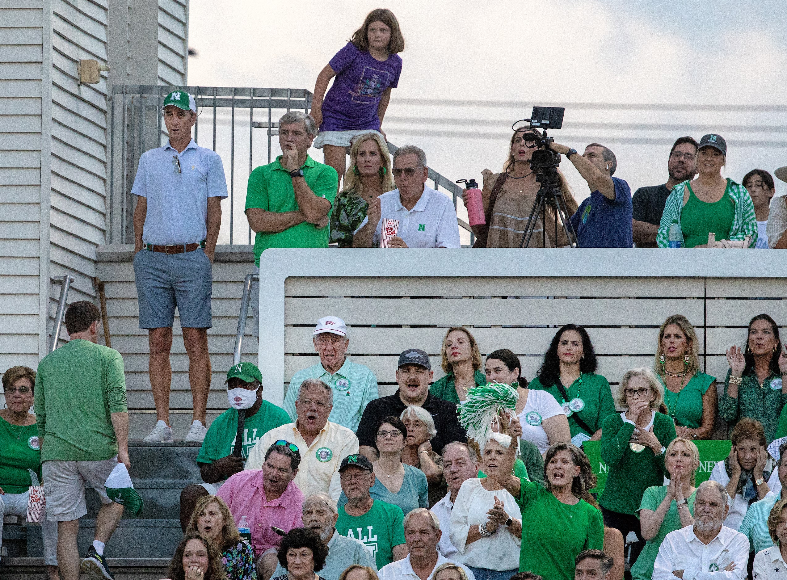 Cooper Manning, upper left, Archie and Olivia Manning look on as Arch Manning and Newman...