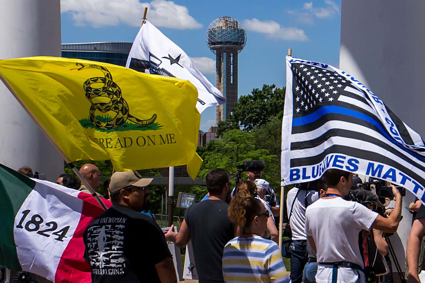 Gun rights advocates demonstrate outside Dallas City Hall at a rally organized by Open Carry...