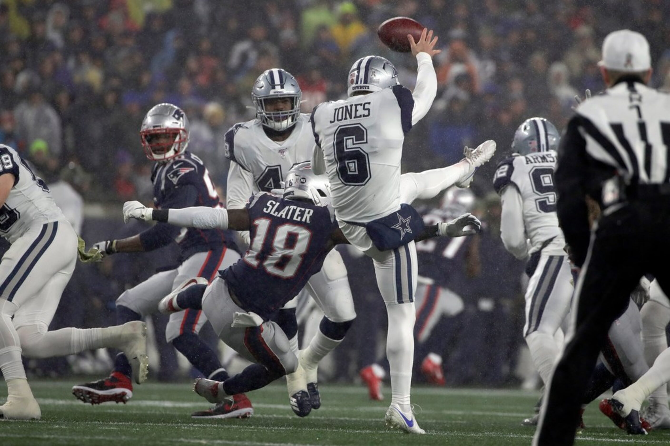 New England Patriots' Matthew Slater (18) blocks a punt by Dallas Cowboys punter Chris Jones...