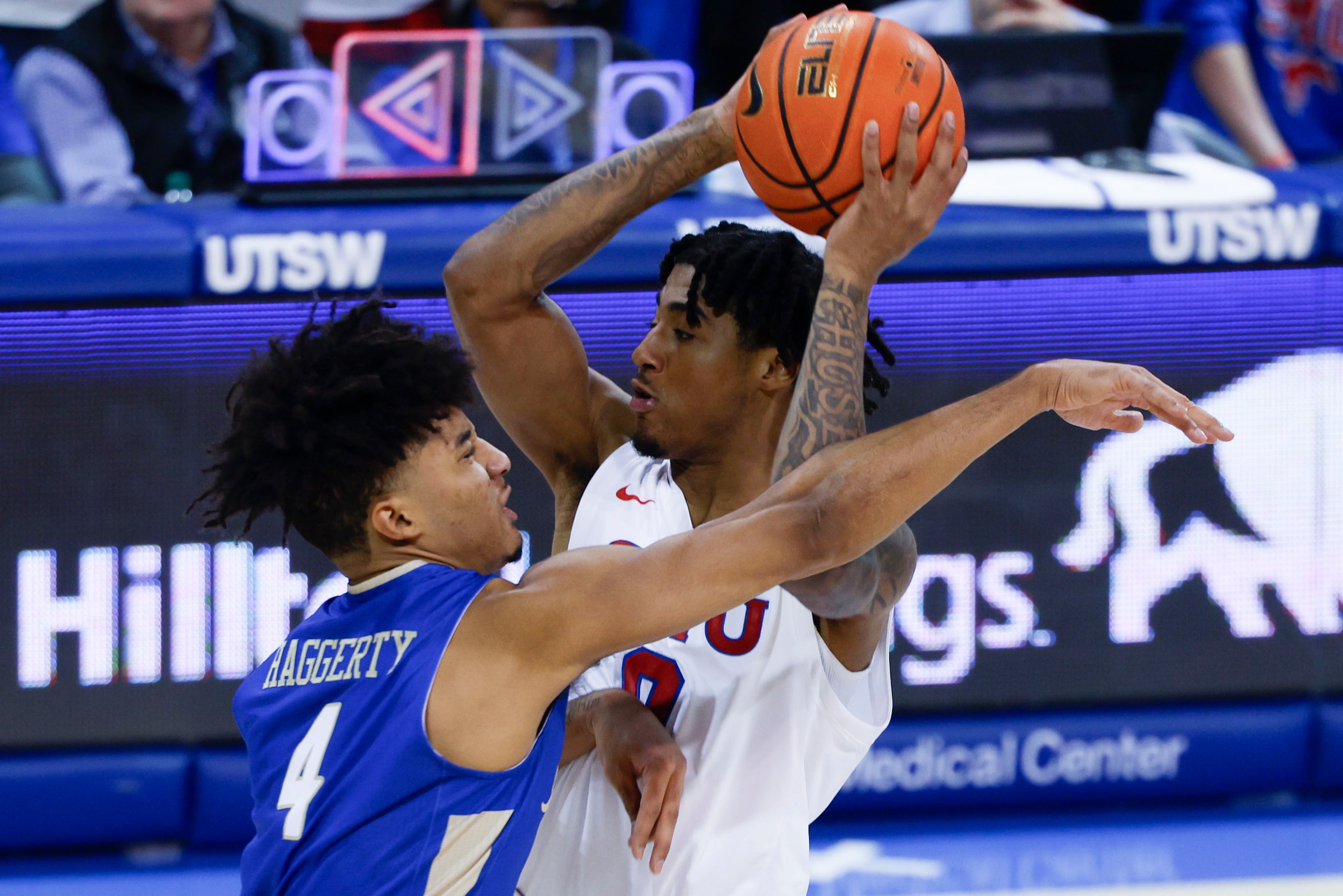 Tulsa guard PJ Haggerty (left) defends against Southern Methodist guard B.J. Edwards during...