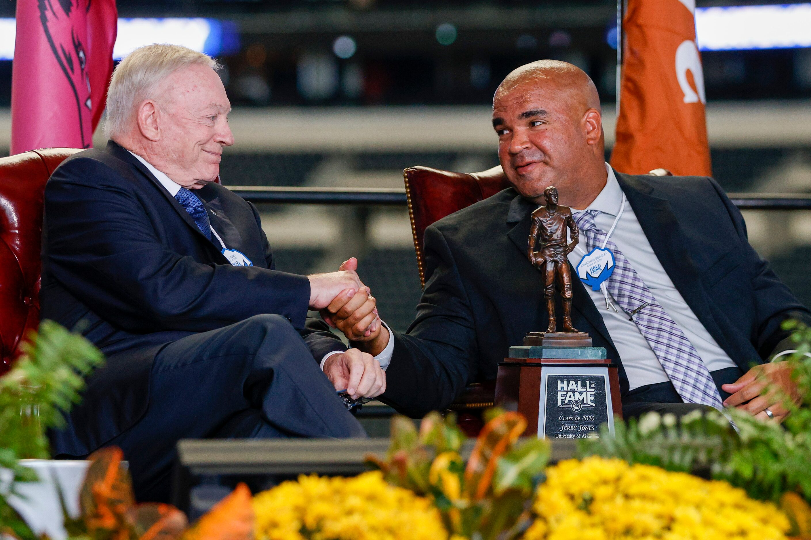 Dallas Cowboys owner Jerry Jones shakes hands with former Kansas State quarterback Jonathan...