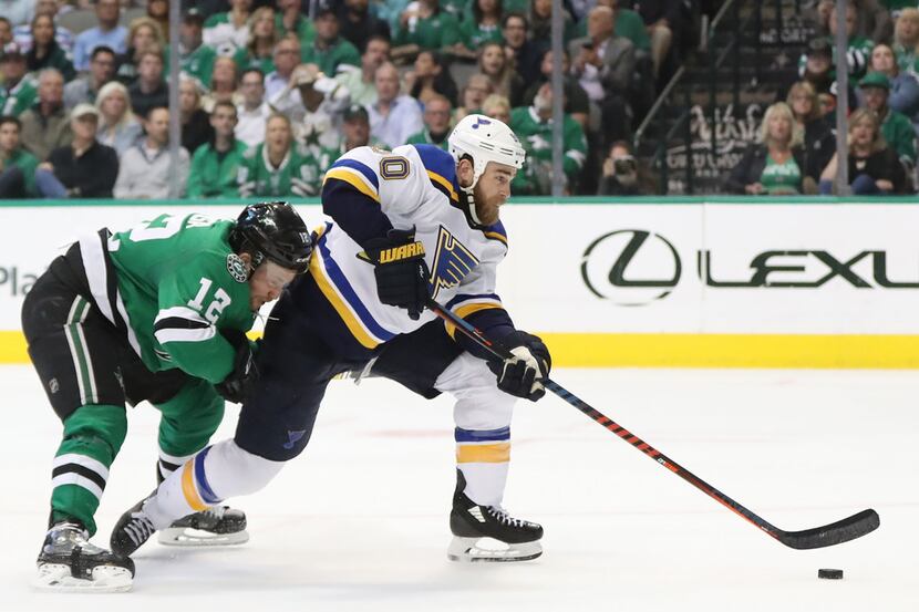 DALLAS, TEXAS - APRIL 29:  Ryan O'Reilly #90 of the St. Louis Blues skates the puck against...