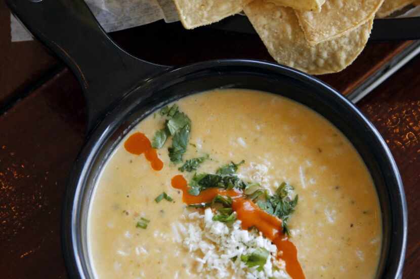 Green Chile Queso & Chips at Torchy's Tacos