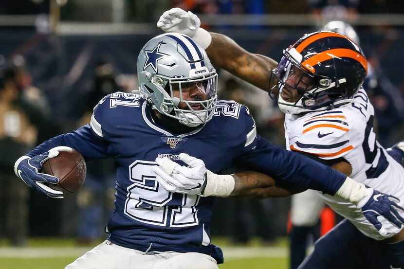 Chicago Bears outside linebacker Leonard Floyd (94) works to bring down Dallas Cowboys...