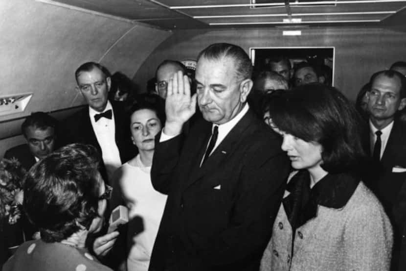 Vice President Lyndon Johnson takes the oath of office to become president on Nov. 22, 1963,...