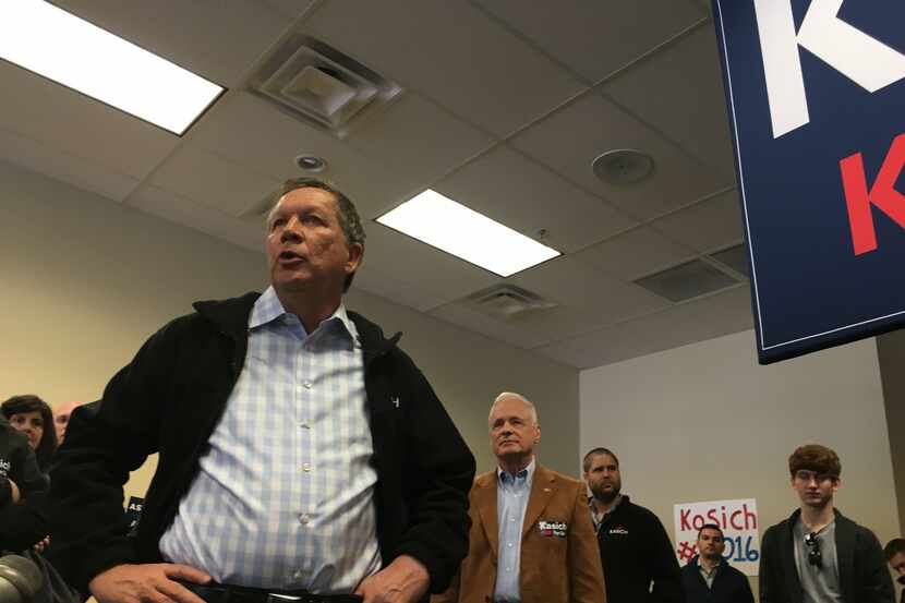 
Republican presidential candidate John Kasich talks to the crowd during a campaign stop in...