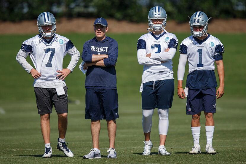 FILE - Dallas Cowboys quarterbacks coach Kellen Moore watches with quarterbacks Cooper Rush...
