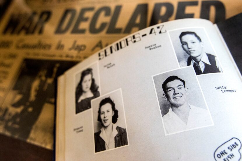 A 1942 McKinney High School yearbook, showing Younger at bottom right, sits on the bed of...