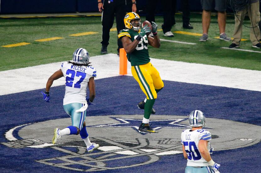 Green Bay Packers tight end Jared Cook (89) catches a touchdown pass on the Dallas Cowboys...