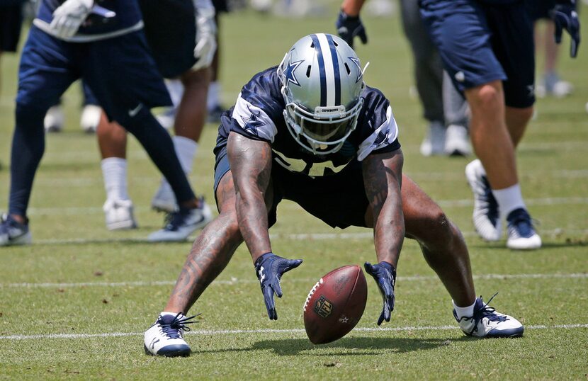 Dallas Cowboys defensive back Kavon Frazier (35) recovers a fumble during Dallas Cowboys OTA...