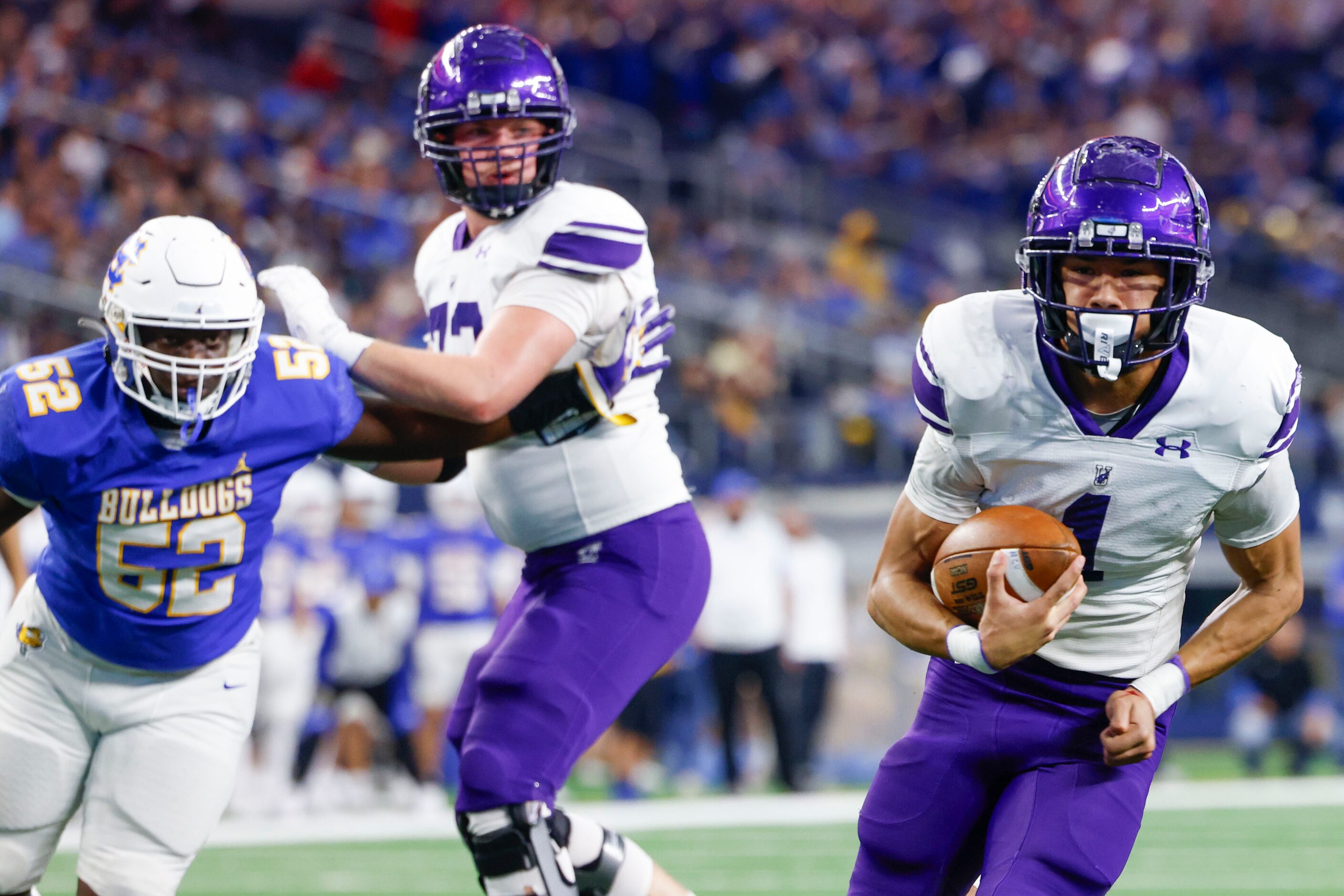 Anna High’s Edward Chumley (right) runs to the end zone to score a touchdown against Tyler...