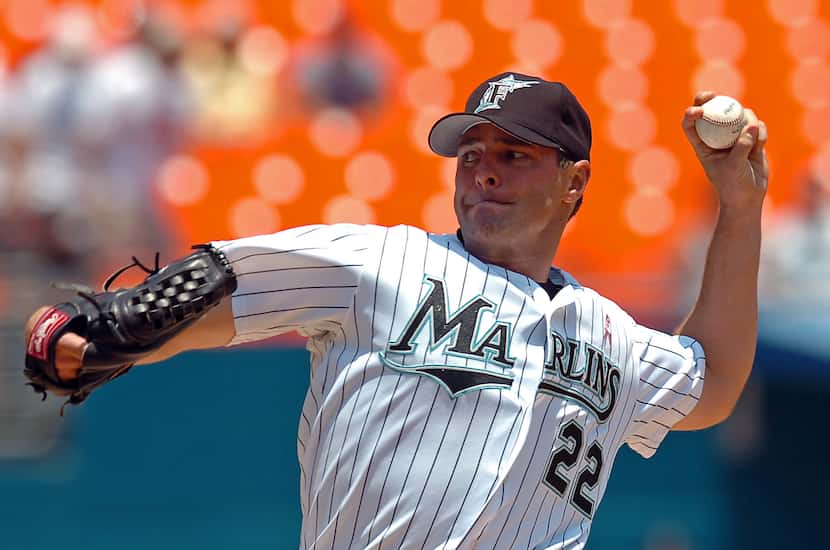 Florida Marlins starting pitcher Al Leiter throws during the first inning against the...